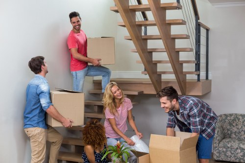 Moving house service in Maida Hill with packed boxes and furniture