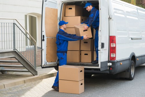 Packed boxes and furniture prepared for a Maida Hill house move