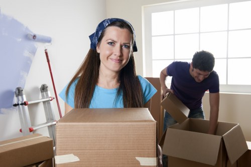 Local movers handling access challenges on a Maida Hill street