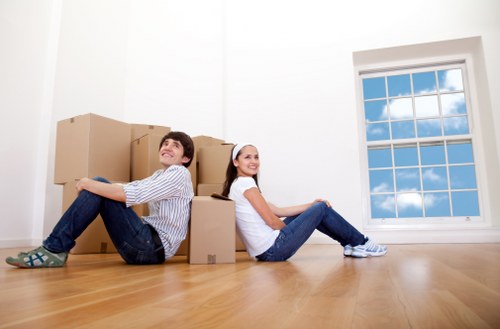 Packing and preparing items for a man with a van move in Maida Hill