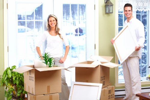 Commercial removals van loading office items in West London